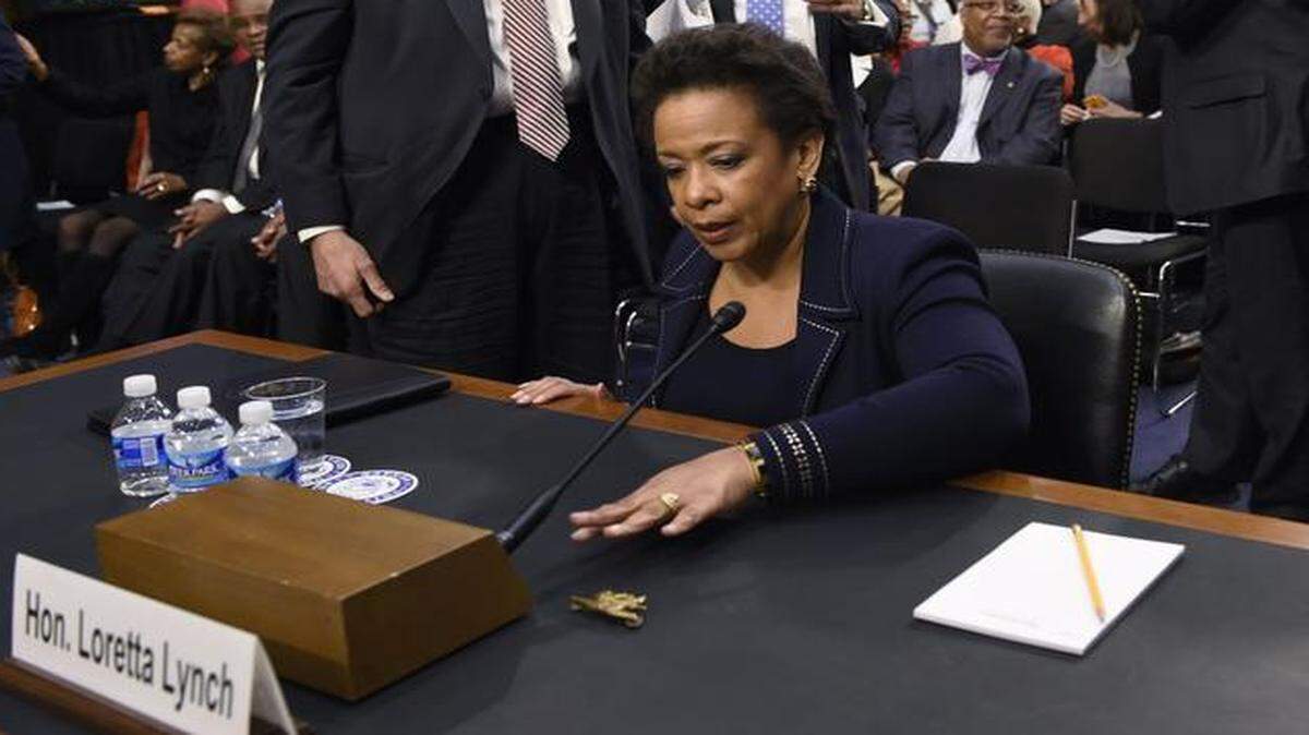 
U.S. attorney general nominee Loretta Lynch reached for the Navy SEAL trident pin of her brother, who died in 2009, during a break in her testimony last month on Capitol Hill.

