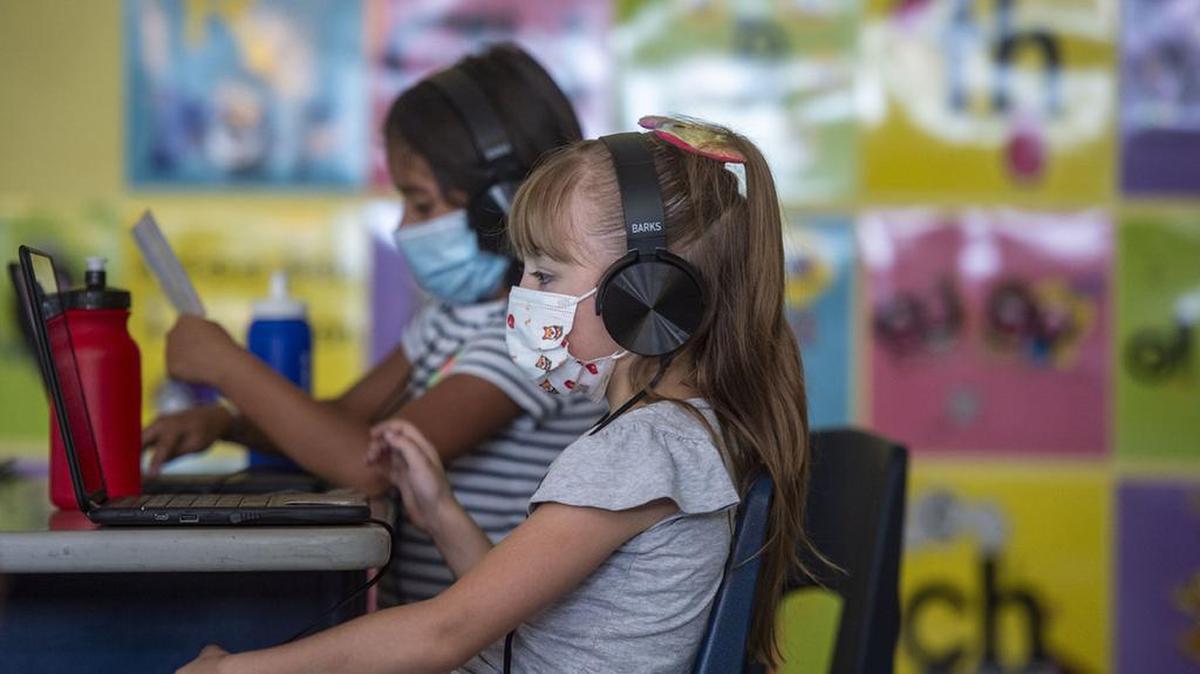 Kids learn on their computers in a first grade classroom, Wednesday, July 21, 2021 at Phillis Wheatley Elementary School in Kansas City.