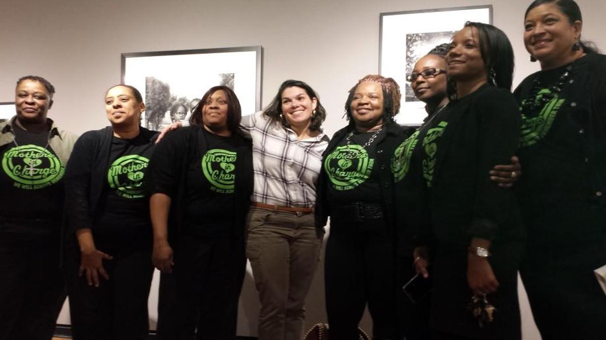 Rosilyn Temple (fourth from right) was honored in December at a fundraiser for KC Mothers in Charge.