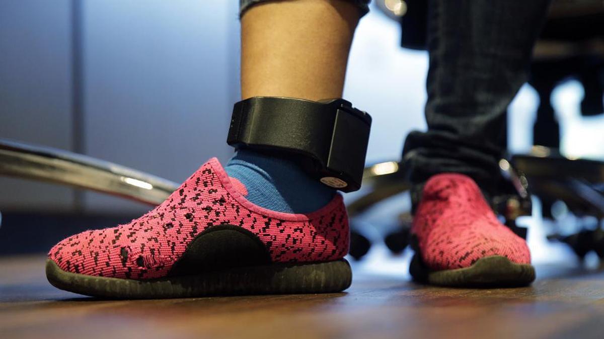 Modern monitoring devices can let people go about their lives while awaiting trial.