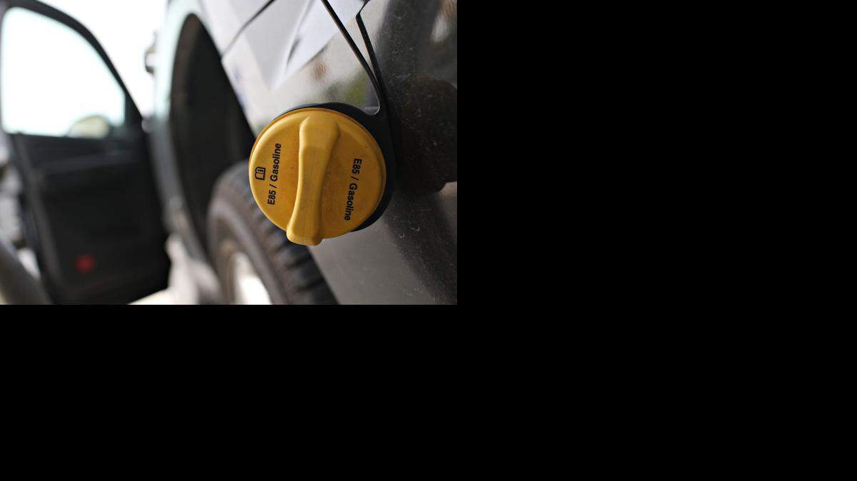 
The gas cap of a flex fuel Chevrolet Tahoe reads E85/Gasoline as the vehicle is filled with E85, a mixture of 85 percent ethanol and gasoline.
