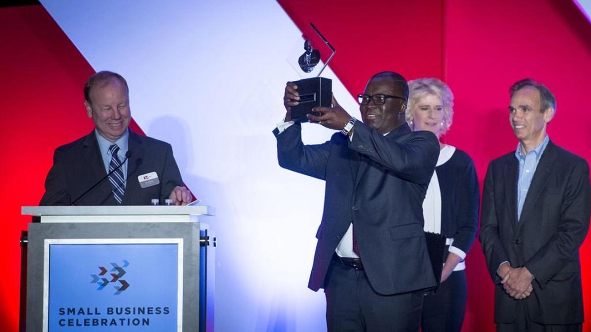 Ike Nwabuonwu of Alpha Energy and Electic, Inc., is one of 7,000 immigrant entrepreneurs who help Kansas City thrive. Joe Reardon gave him the Greater Kansas City Chamber of Commerce Mr. K Award earlier this year.