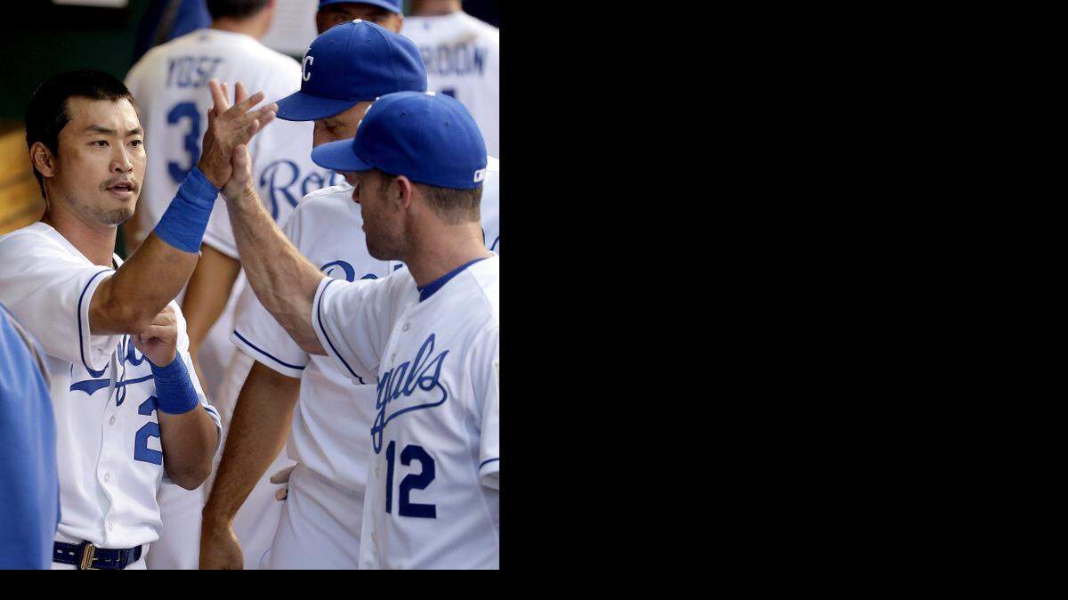 
Nori Aoki (left) celebrated with Jayson Nix during Sunday’s game.
