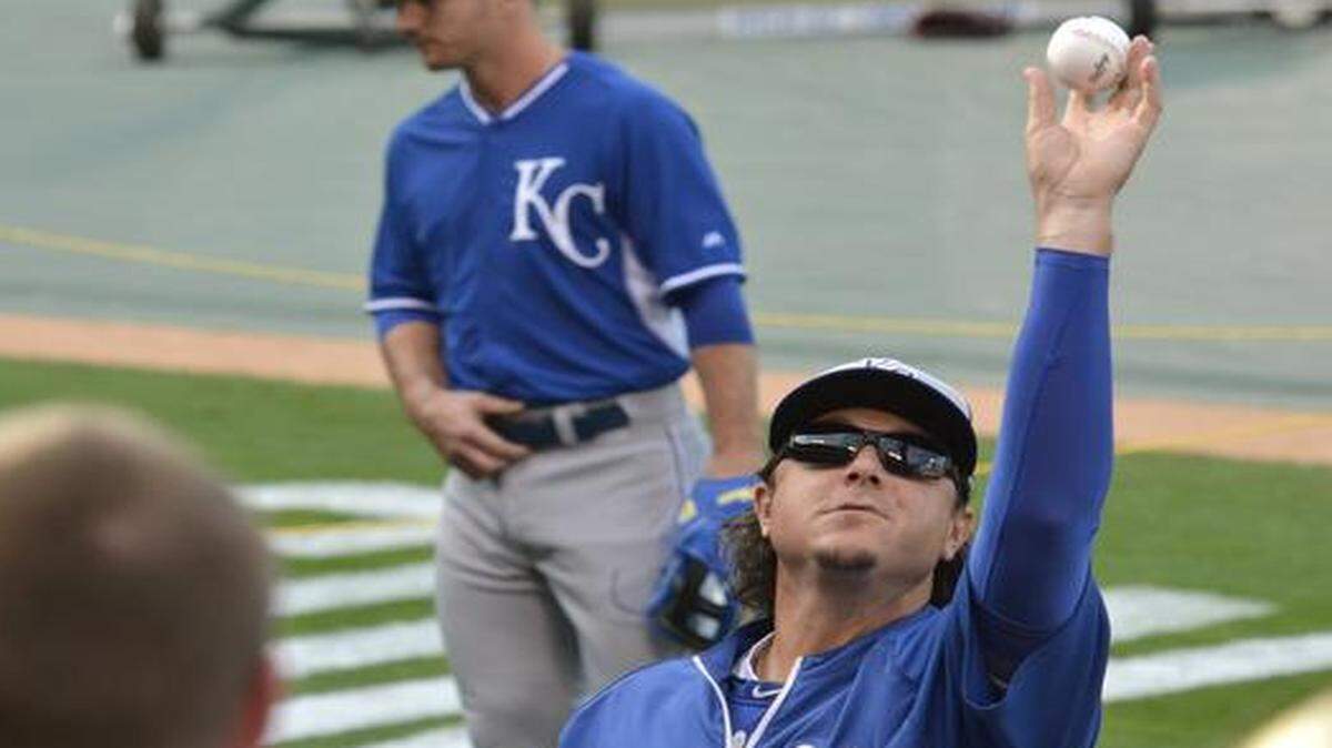 
Kansas City Royals pitcher Scott Downs was friendly with the crowd before a game with the Angels in Anaheim, Calif., on Oct. 3, and apparently he was even friendlier in Baltimore, playing catch with some local kids decked out in Orioles gear while players were shagging fly balls during batting practice.


