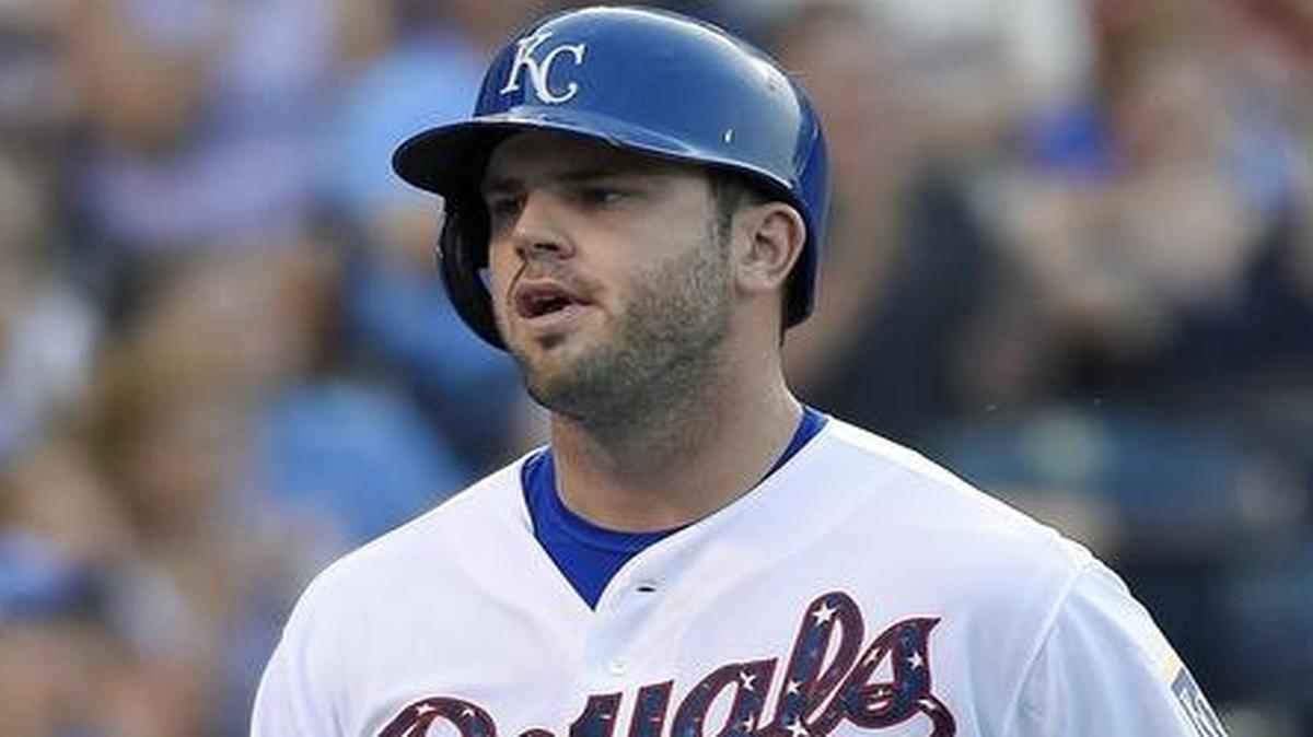 
The Royals’ Mike Moustakas (8) was greeted by teammate Alex Gordon after scoring on a fielder’s choice in the fifth inning Saturday night against the Minnesota Twins at Kauffman Stadium. Mike Moustakas left Sunday’s game against the Twins in the sixth inning because of a family emergency, Royals manager Ned Yost said. It was the second time this season a family emergency has led to Moustaka’ absence.
