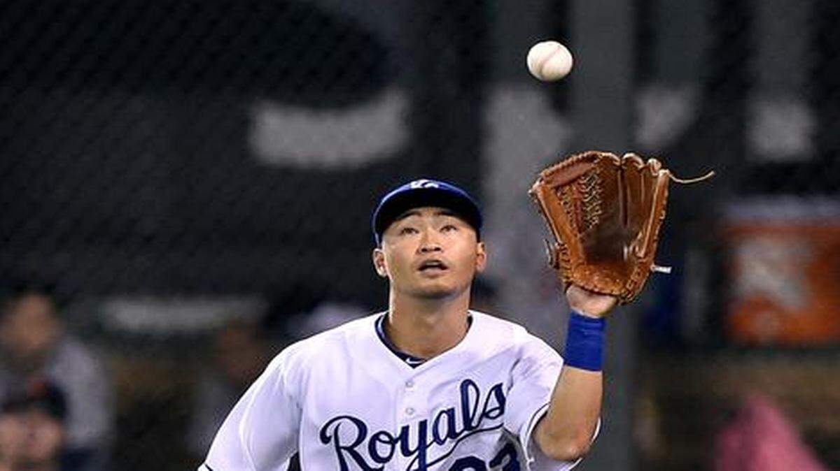 
Royals right fielder Norichika Aoki (23) ran down an out on the Tigers' Rajai Davis during Friday's baseball game at Kauffman Stadium.

