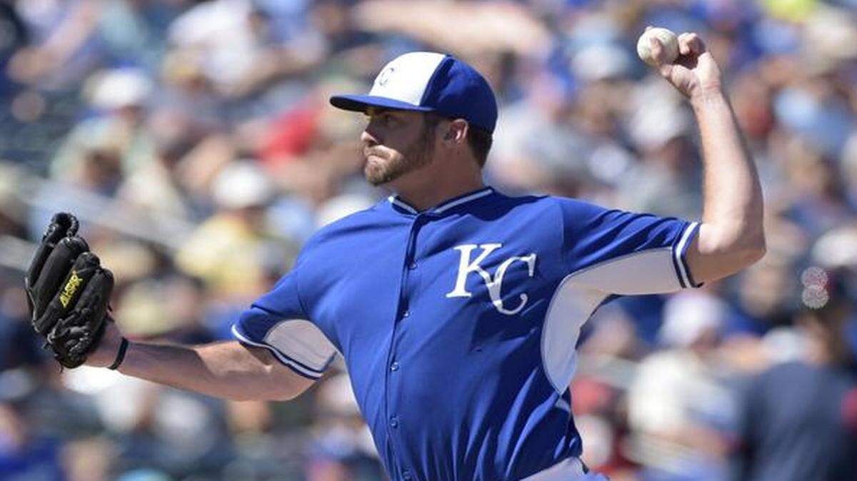 
Royals relief pitcher Brian Flynn delivers a pitch during during a spring training baseball game Surprise, Ariz.
