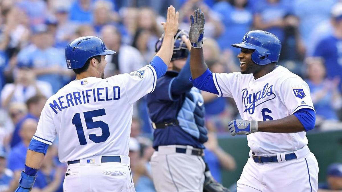 Kansas City Royals center fielder Lorenzo Cain was congratulated by Whit Merrifield after both scored on Cain’s two-run homer in Tuesday’s game.