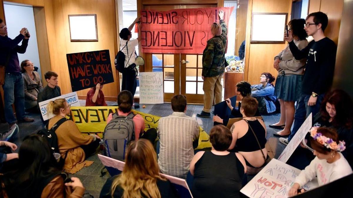 UMKC students and supporters sat outside the chancellor’s office on Wednesday, March 8, 2017, after marching across campus to demand the university change policies regarding rape.
