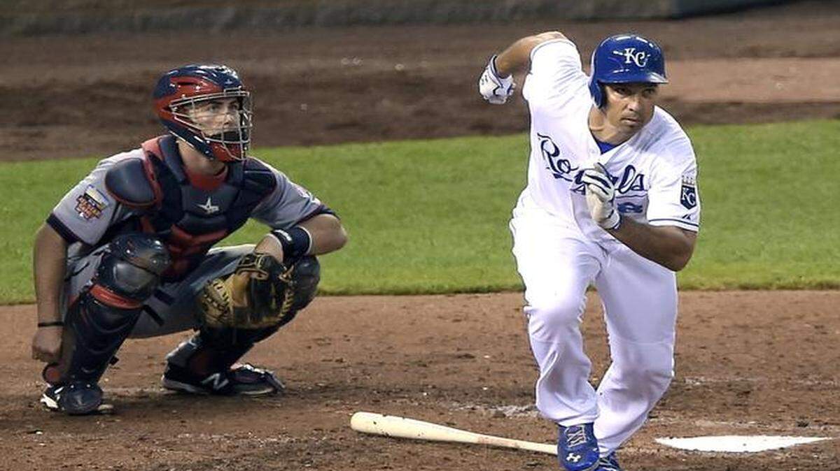 
Raul Ibanez followed through on a double in the fifth inning in front of Minnesota Twins catcher Eric Fryer during a game in July.

