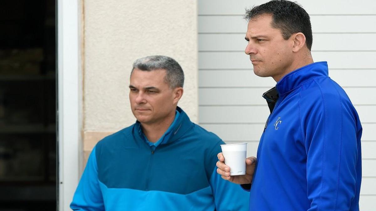 Kansas City Royals general manager Dayton Moore (left) and assistant general manager J.J. Picollo during spring training in February 2015 in Surprise, Ariz.