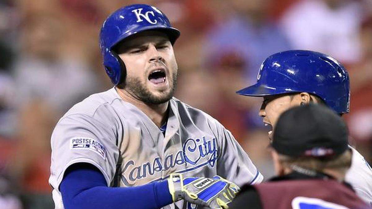 
Mike Moustakas celebrated with Nori Aoki after hitting a solo home run in the 11th inning in game one of the ALDS.
