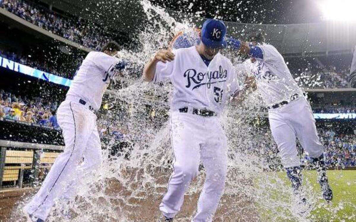 
Kansas City Royals starting pitcher Jason Vargas got a dousing from teammates Christian Colon and Salvador Perez following Vargas’ complete-game shutout of the Oakland Athletics on Wednesday.
