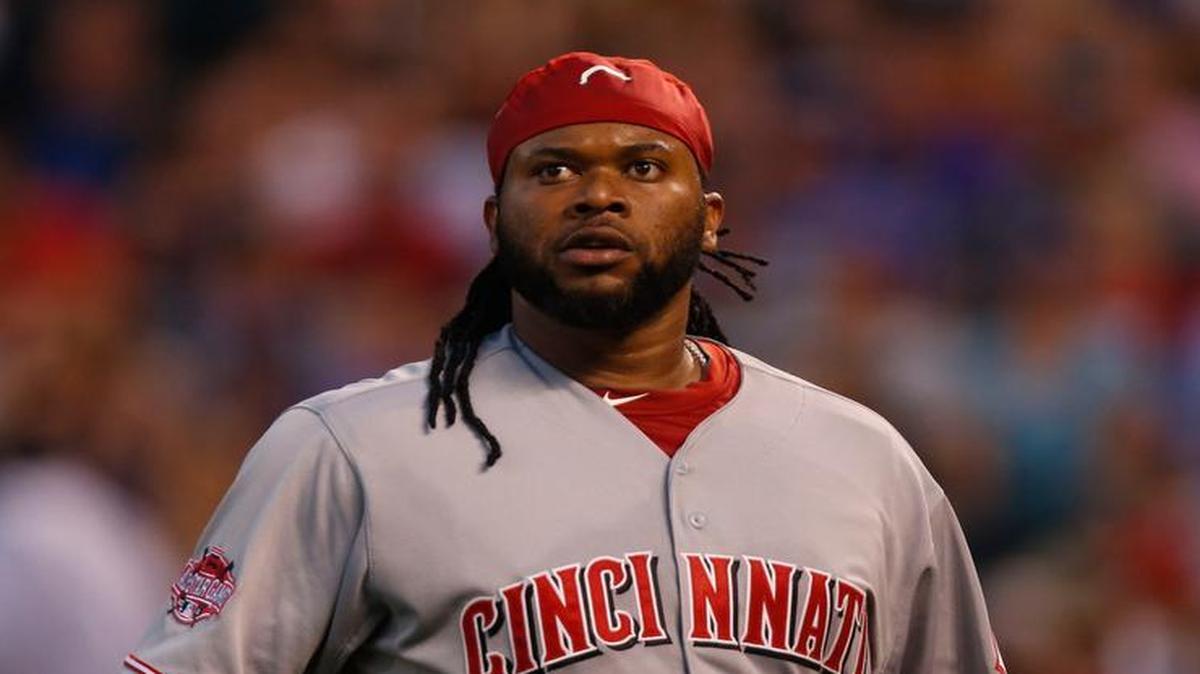 
Cincinnati Reds starting pitcher Johnny Cueto (47) headed to the dugout after retiring the Rockies in the seventh inning of Saturday’s baseball game in Denver. Cincinnati won 5-2.
