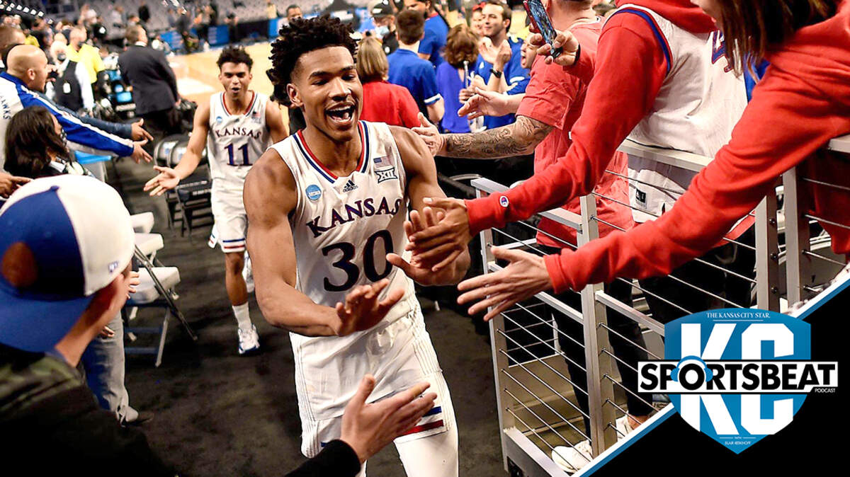KU’s Ochai Agbaji and teammate Remy Martin breathed a sigh of relief and were greeted by Jayhawks fans after beating Creighton 79-72 in a second-round NCAA Tournament game Saturday in Fort Worth, Texas.