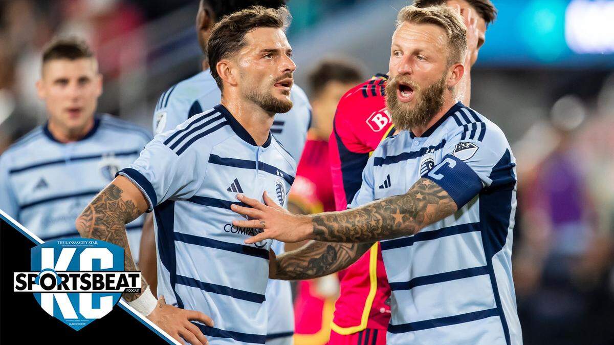 Sporting Kansas City forward Johnny Russel (7) attempts to calm teammate defender Tim Liebold (14) after a called penalty during the inaugural match between Sporting Kansas City and St. Louis City SC played at CITYPARK in St. Louis, Missouri.