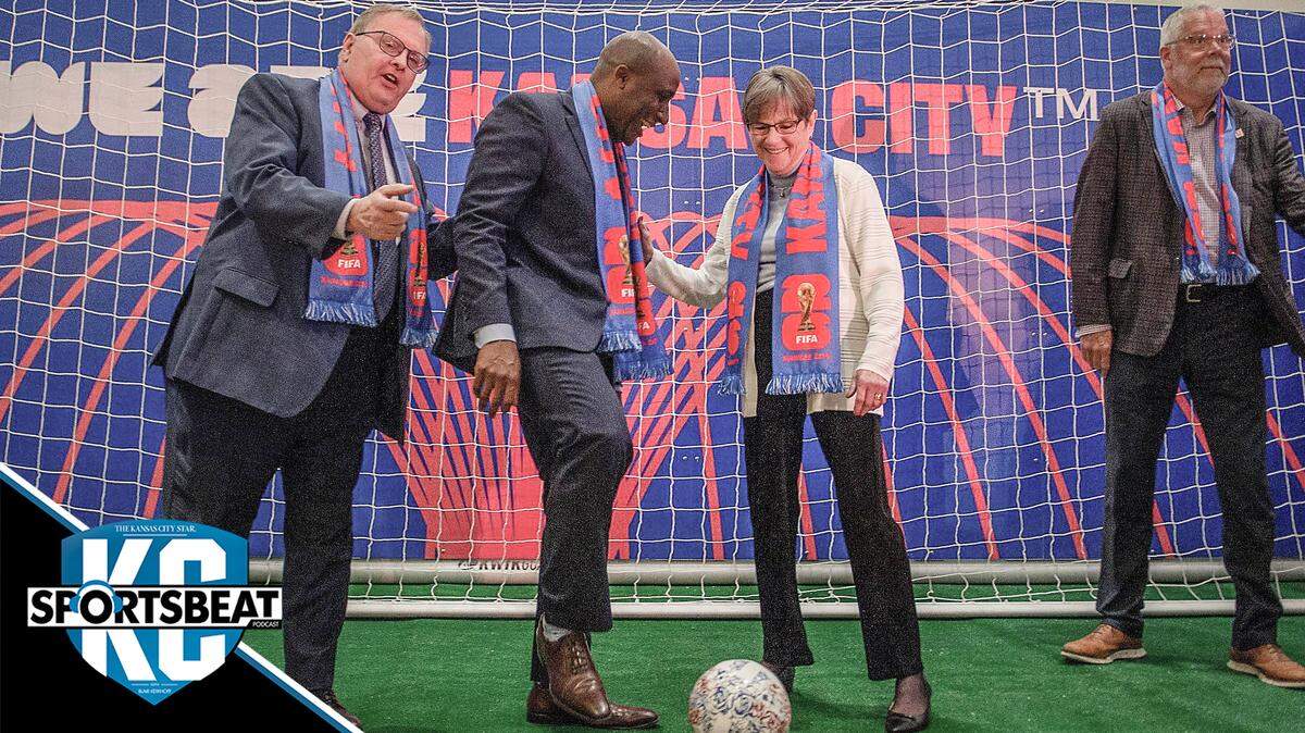 Kansas City Mayor Quinton Lucas, second from left, and Kansas Gov. Laura Kelly prepare to pose for photos after Thursday’s FIFA 2026 World Cup news conference at Arrowhead Stadium.