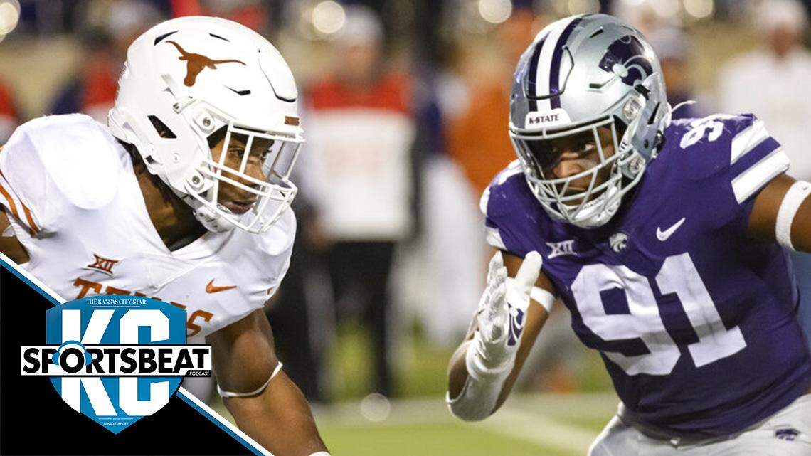 Texas running back Bijan Robinson (5) is pursued by Kansas State defensive end Felix Anudike-Uzomah (91) during the second half of an NCAA college football game Saturday, Nov. 5, 2022, in Manhattan, Kan. (AP Photo/Reed Hoffmann)