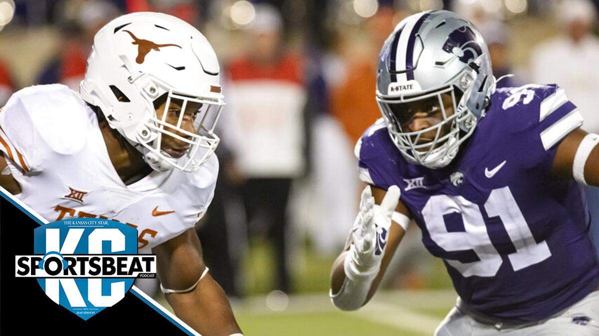 Texas running back Bijan Robinson (5) is pursued by Kansas State defensive end Felix Anudike-Uzomah (91) during the second half of an NCAA college football game Saturday, Nov. 5, 2022, in Manhattan, Kan. (AP Photo/Reed Hoffmann)