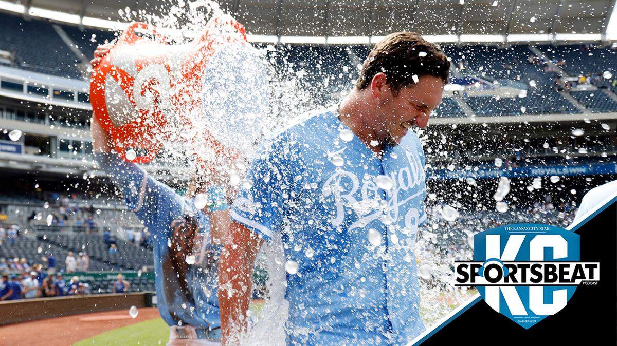 Kansas City Royals’ Vinnie Pasquantino (9) is doused by Bobby Witt Jr., left, after the first game of a baseball doubleheader against the Detroit Tigers in Kansas City, Mo., Monday, July 11, 2022. (AP Photo/Colin E. Braley)