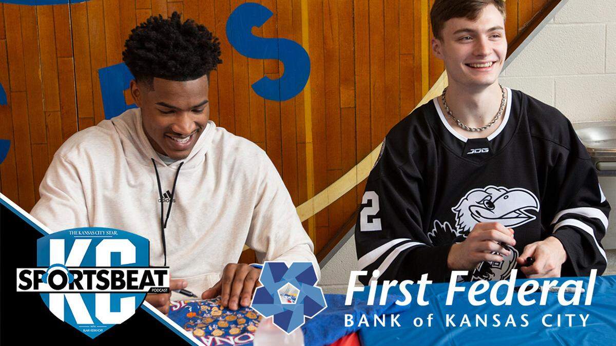 University of Kansas basketball stars Ochai Agbaji, left, and Christian Braun sign autographs at East High School. Wichita was the first stop of the state-wide barnstorming tour for the Kansas men’s basketball national championship team. Because of recent NCAA policy changes, all 18 players on the 2021-22 KU team — not just the graduating seniors — were eligible to participate on the tour. (April 23, 2022)