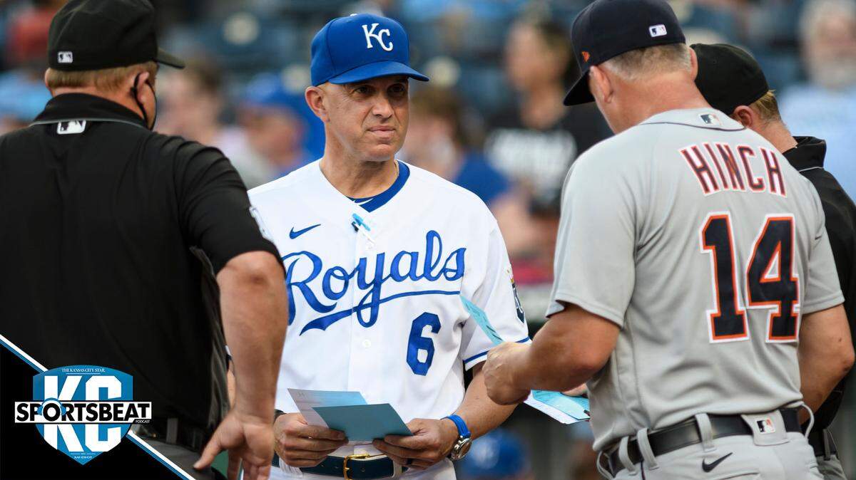 Kansas City Royals bench coach Pedro Grifol meets with Detroit Tigers manager A.J. Hinch and the umpires before the start of their baseball game in Kansas City, Mo., Monday, June 14, 2021. (AP Photo/Reed Hoffmann)