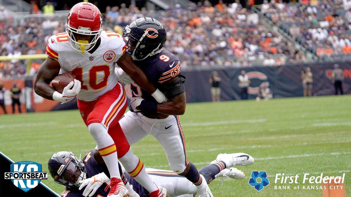 Kansas City Chiefs running back Isiah Pacheco is driven out of bounds near the goal line by Chicago Bears safety Jaquan Brisker in the first half of an NFL preseason football game Saturday, Aug. 13, 2022, in Chicago. (AP Photo/David Banks)