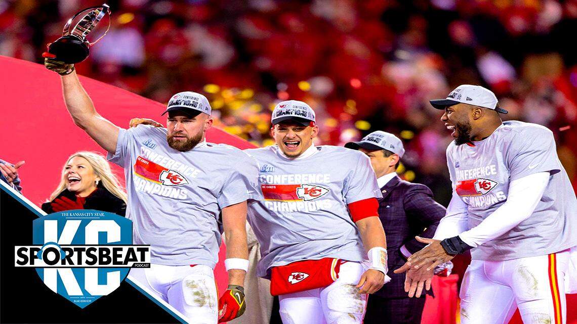 Kansas City Chiefs tight end Travis Kelce, left, hoists the Lamar Hunt trophy with defensive end Carlos Dunlap, left, and quarterback Patrick Mahomes after defeating the Cincinnati Bengals 23-20 in the AFC Championship at GEHA Field at Arrowhead Stadium on Sunday, Jan. 29, 2023, in Kansas City.