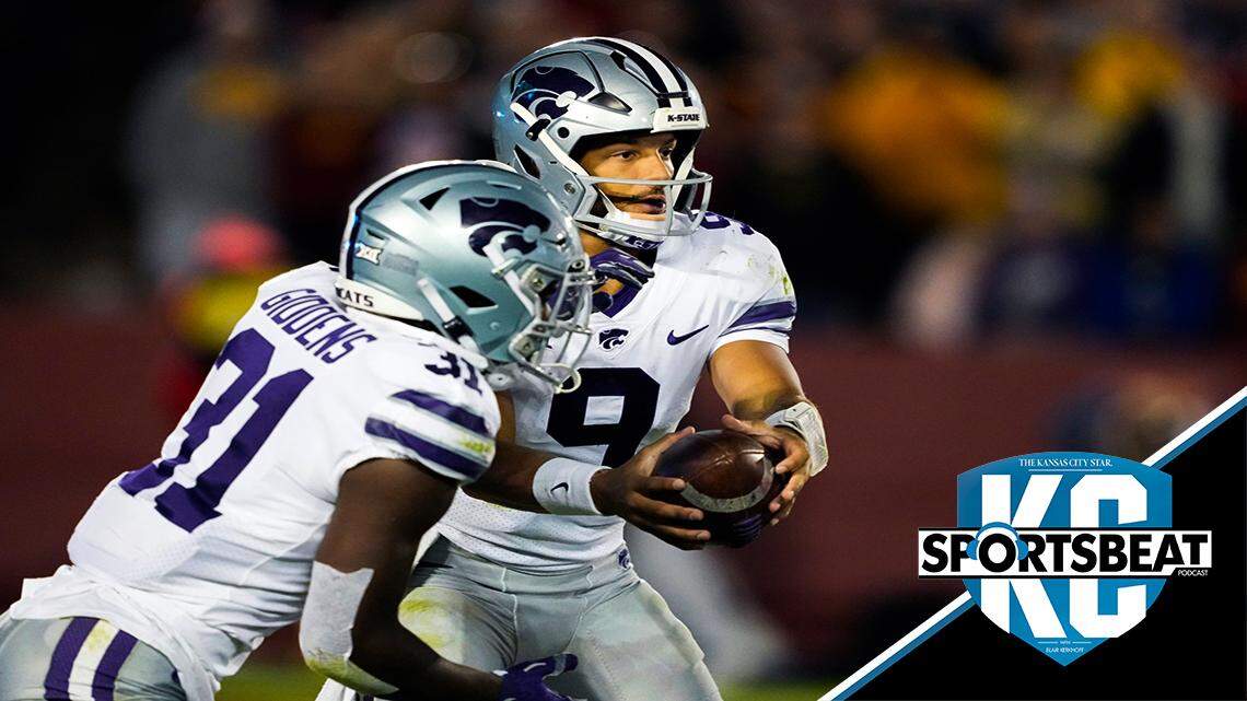 Kansas State quarterback Adrian Martinez (9) hands off to running back DJ Giddens (31) during the second half of an NCAA college football game against Iowa State, Saturday, Oct. 8, 2022, in Ames, Iowa. (AP Photo/Matthew Putney)