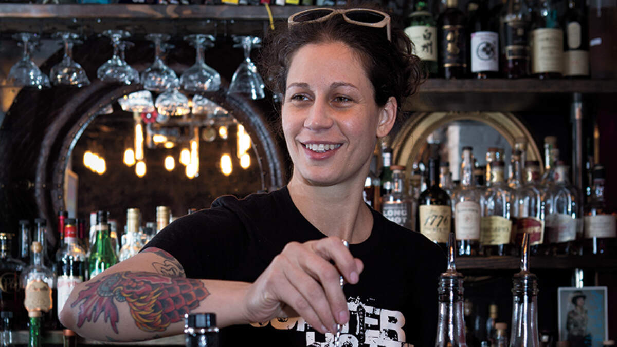 Jill Cockson, owner of Chartreuse Saloon in the East Crossroads worries how a new ballpark in that area would affect the neighborhood.