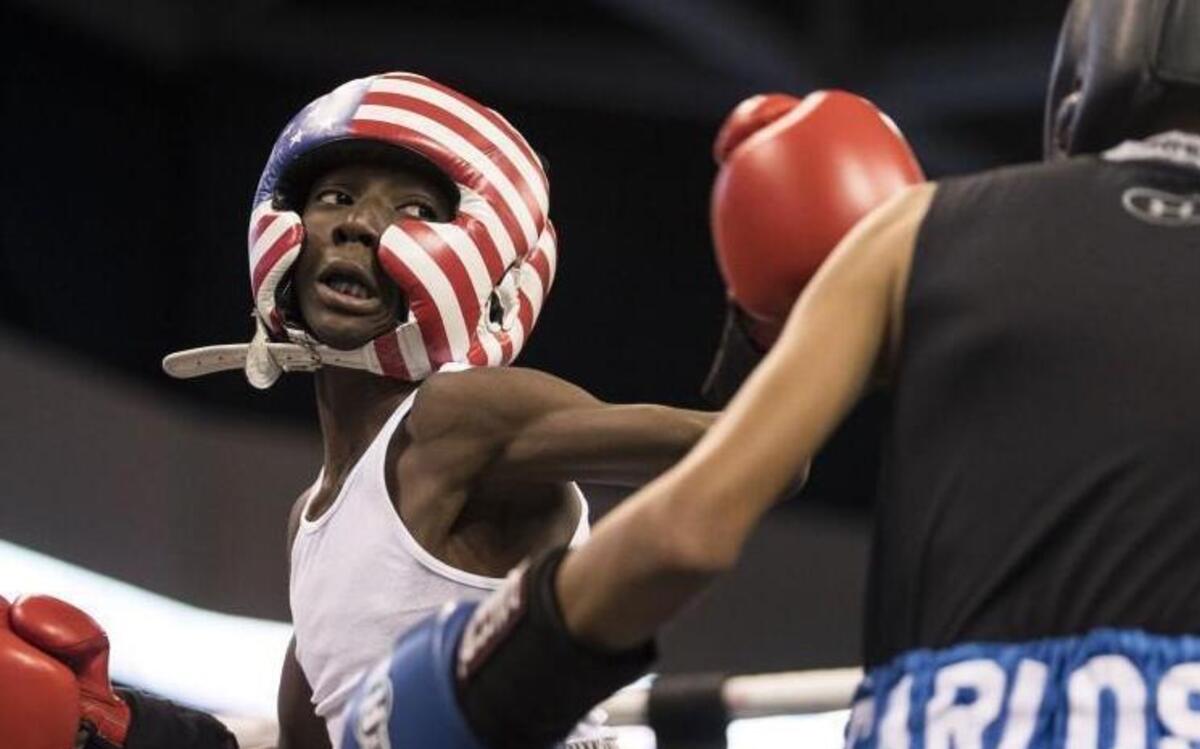 Izak Carlos of Olathe, Kansas (right) and Kyree Williams of Philadelphia, Penn., boxed during the 16th Annual Ringside Championships on Friday at the Silverstein Eye Center Arena in Independence.