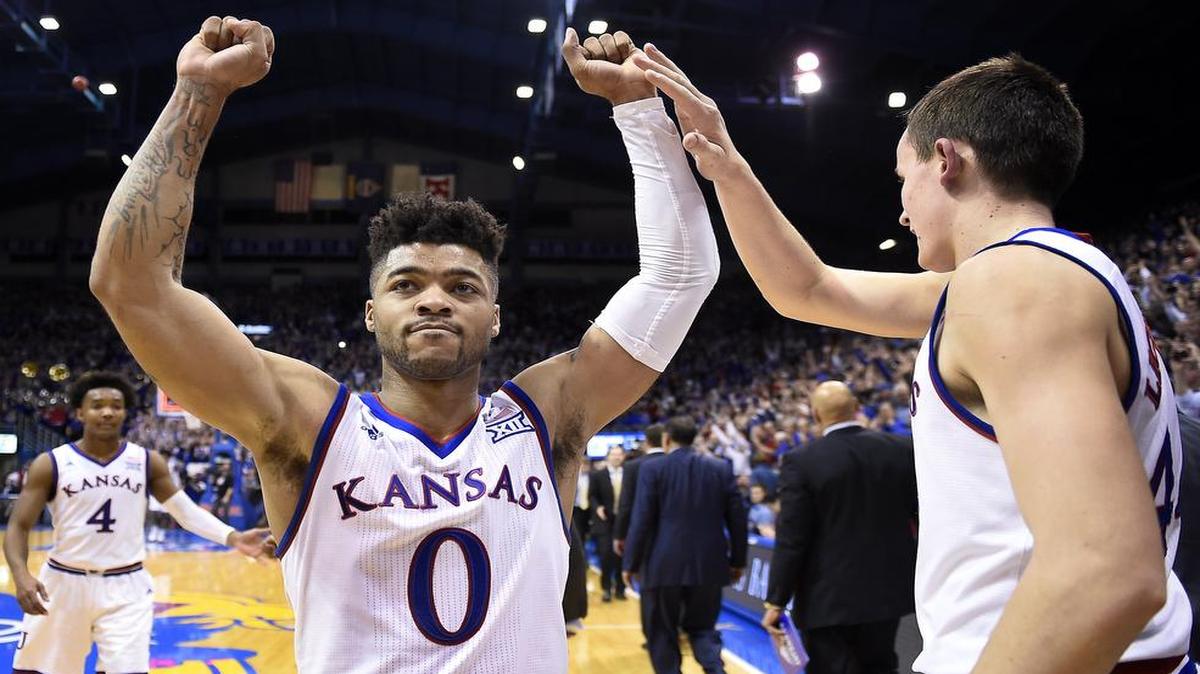 Frank Mason (center) after the Kansas beat Baylor on Wednesday night at Allen Fieldhouse in Lawrence.