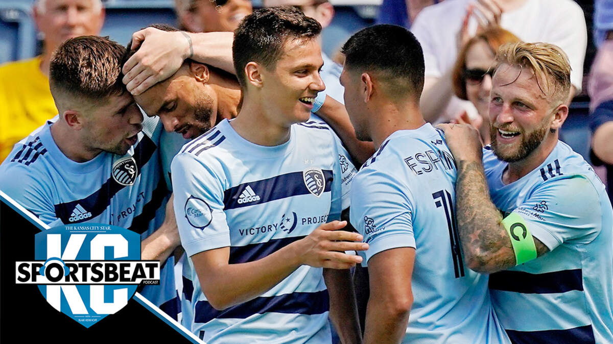 Sporting Kansas City players celebrate a goal by forward Daniel Salloi, center, during the second half of an MLS soccer match against the Austin FC Saturday, June 12, 2021, in Kansas City, Kan. The match ended tied 1-1. (AP Photo/Charlie Riedel)