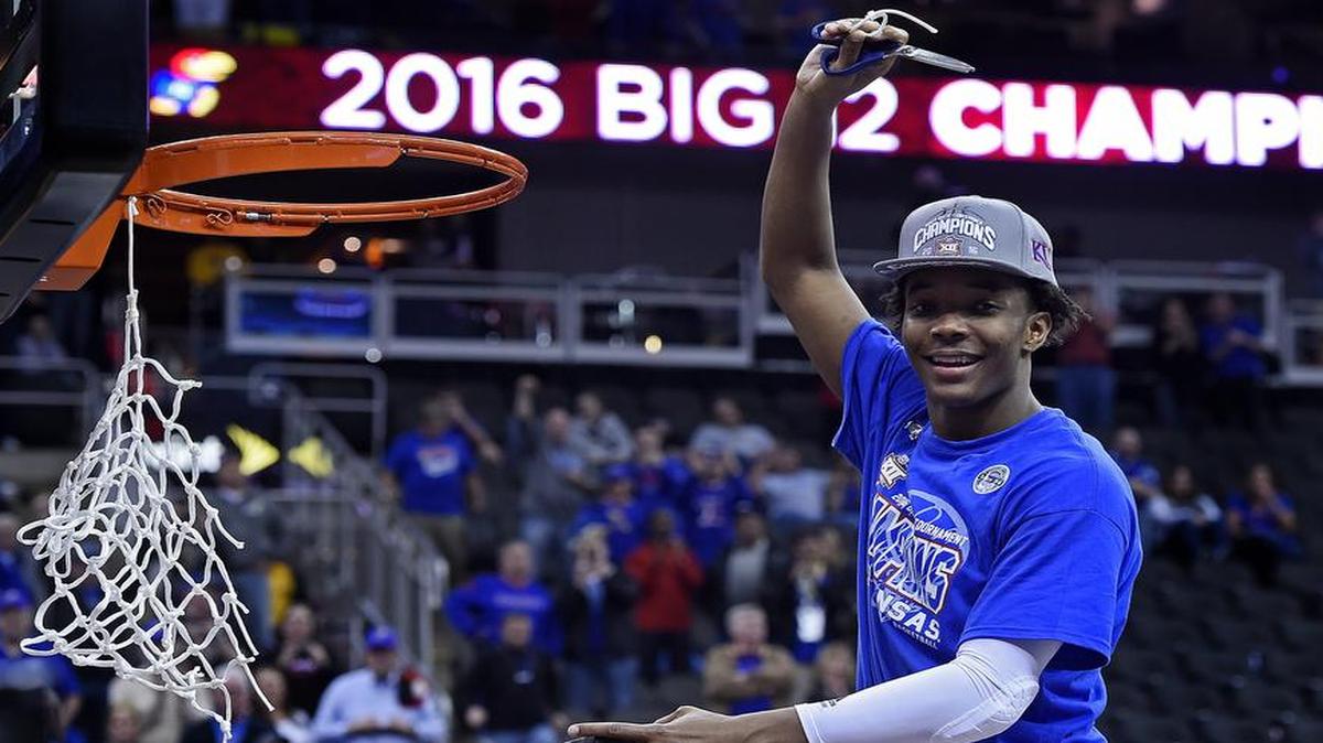 Big 12 Tournament MVP Devonte Graham sliced off a portion of the net after the Jayhawks beat West Virginia last March at the Sprint Center.