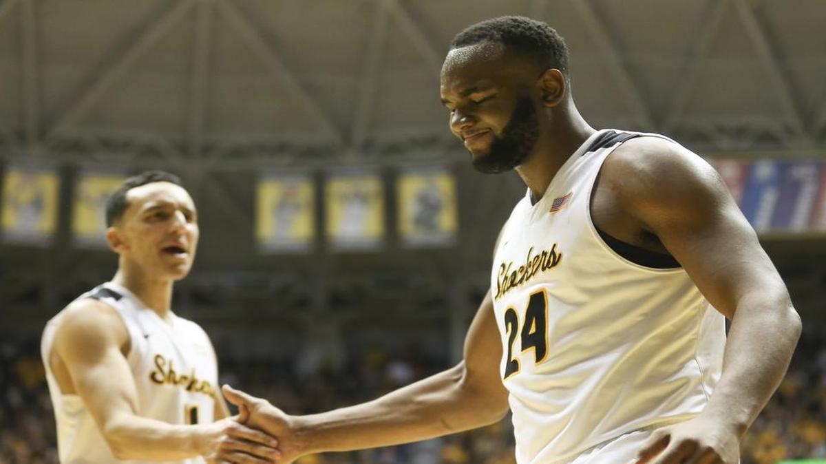 Wichita State center Shaquille Morris got a hand slap from teammate Wichita State guard Landry Shamet after a basket and a foul against Indiana State during the second half Saturday at Koch Arena.