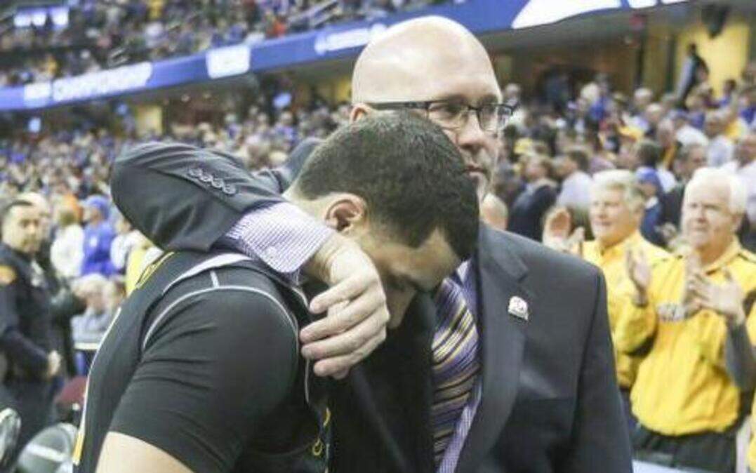 
Wichita State guard Fred VanVleet walked off the court with assistant coach Steve Forbes after the Shockers were defeated by Notre Dame 81-70 in the Midwest Regional semifinal in Cleveland on Thursday.
