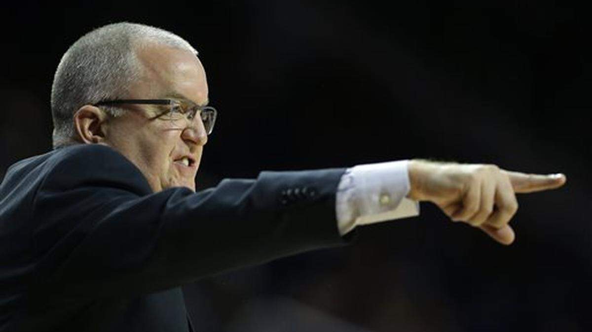 Omaha coach Derrin Hansen talks to his players during the first half of an NCAA college basketball game against Kansas State Tuesday, Dec. 2, 2014 in Manhattan, Kan. AP Photo/Charlie Riedel)