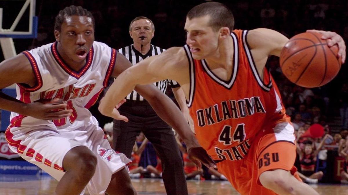 Former Oklahoma State guard Doug Gottlieb dribbled past Iowa State guard Michael Nurse in the Big 12 Tournament in 2000.