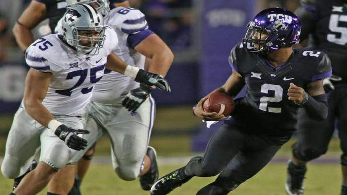 
TCU and quarterback Trevone Boykin (right) are now fourth in the College Football Playoff rankings after an impressive win over Kansas State on Saturday.
