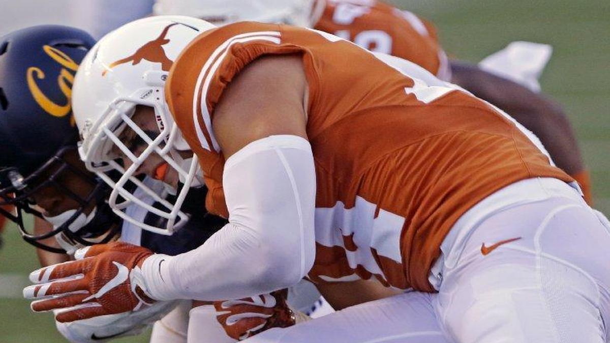 
Texas defensive back Dylan Haines (front) has been criticized by teammates for taking issue with their work ethic.
