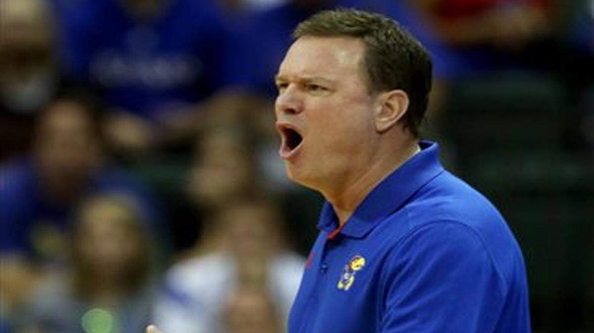 
Kansas head coach Bill Self stands on the sideline during the first half of an NCAA college basketball game against the Michigan State in Lake Buena Vista, Fla., Sunday, Nov. 30, 2014. (AP Photo/Reinhold Matay)
