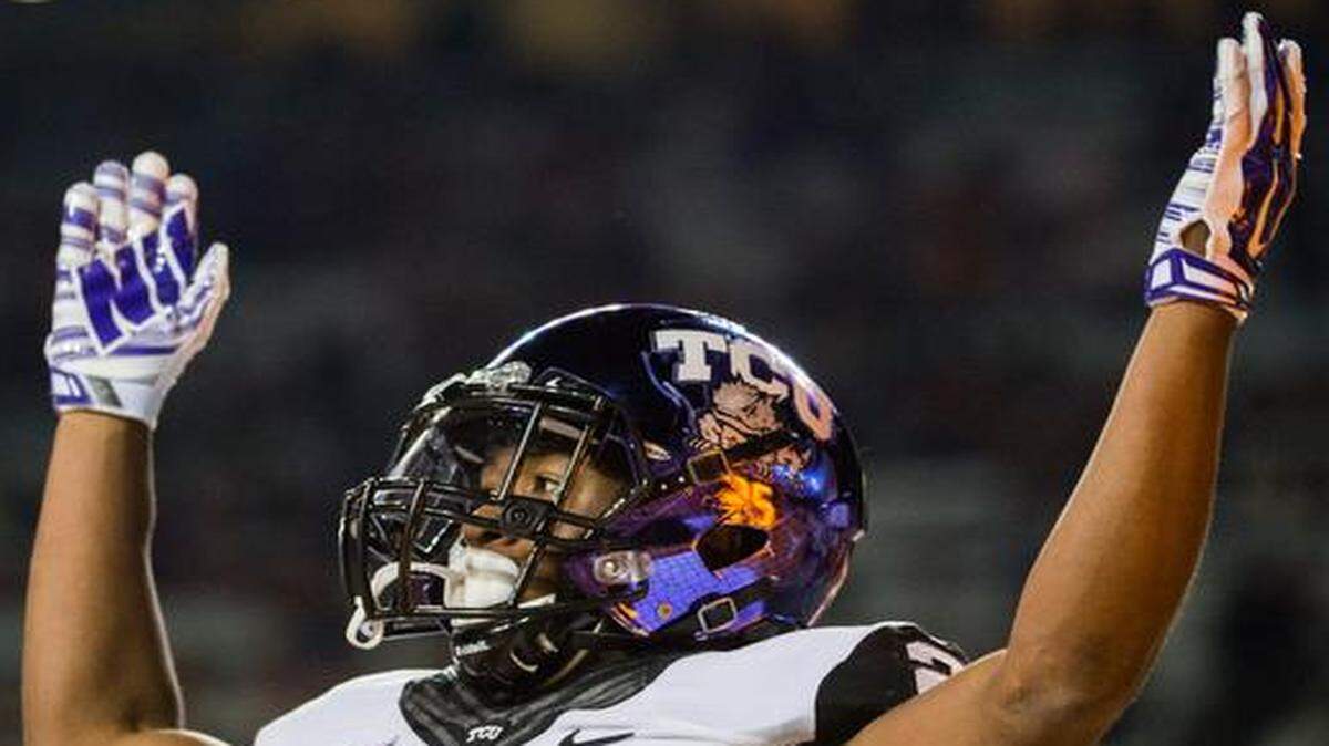 
TCU’s Aaron Green celebrated a touchdown in the second half against Texas on Thursday in Austin, Texas. The Horned Frogs beat the Longhorns and jumped two spots to No. 3 in the latest College Football Playoff rankings released Tuesday night. 

