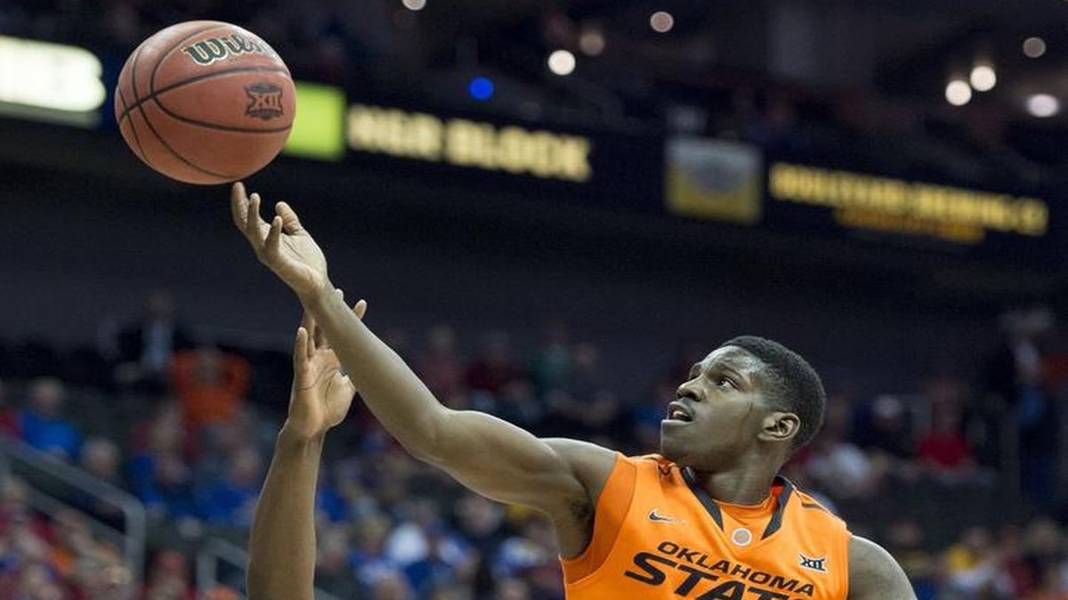 Star guard Jawun Evans (right) has a new head coach at Oklahoma State in Mike Boynton. Boynton had been an assistant at Oklahoma State under Brad Underwood, who recently left for the head coaching job at Illinois.