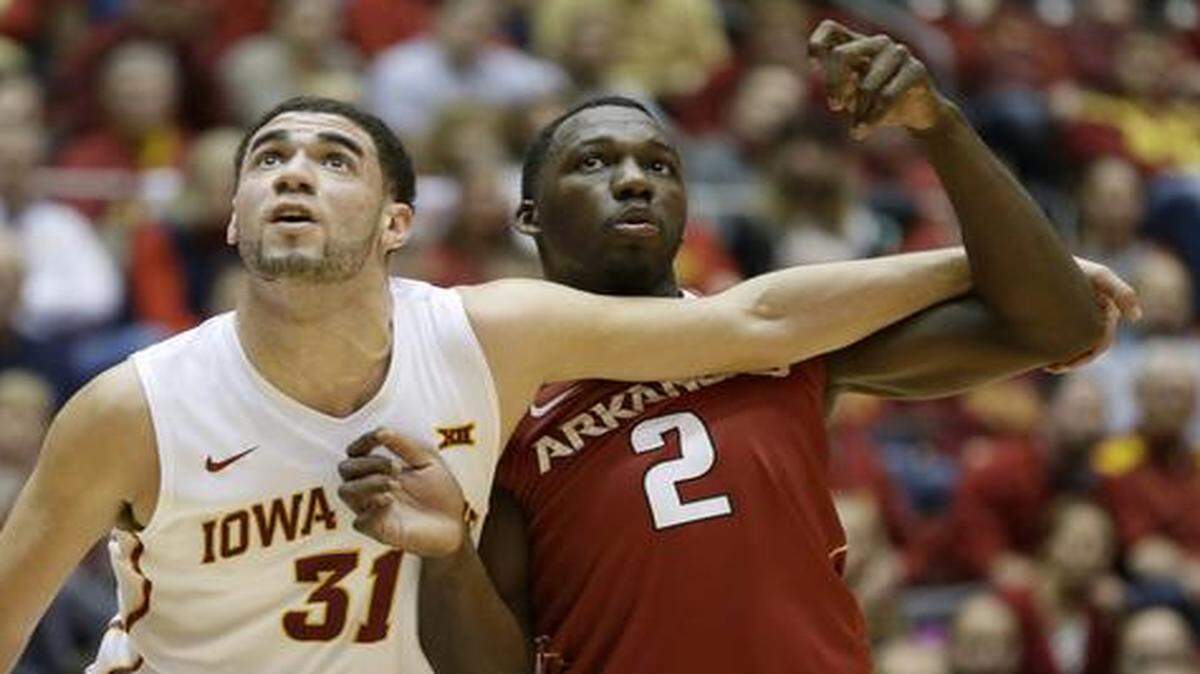 
Iowa State forward Georges Niang (left) battled for rebound position with Arkansas forward Alandise Harris during a game last month in Ames.
