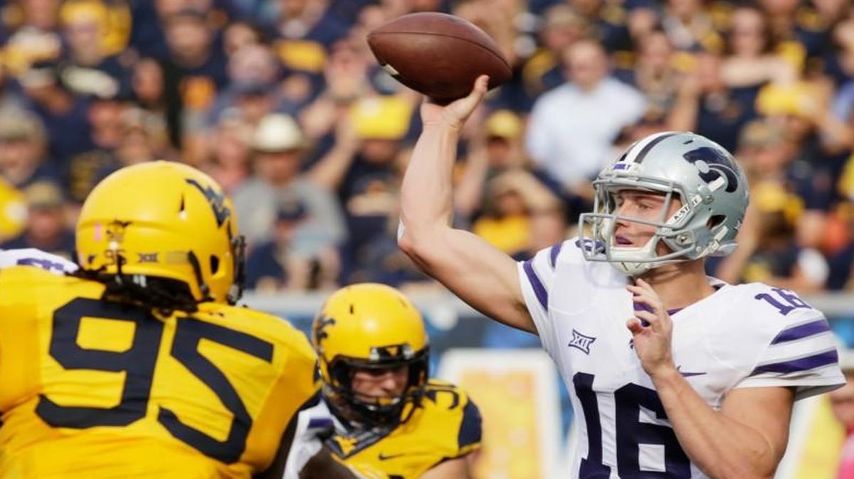 Communication issues often left Kansas State quarterback Jesse Ertz looking to the sideline for play calls as the play clock approached zero. K-State used four timeouts to avoid delay-of-game penalties and got flagged for a delay once.