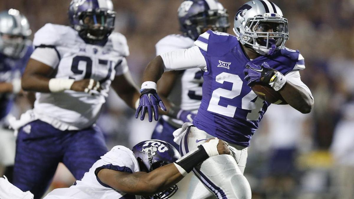 Charles Jones took off for a touchdown run in K-State’s game against TCU last season.