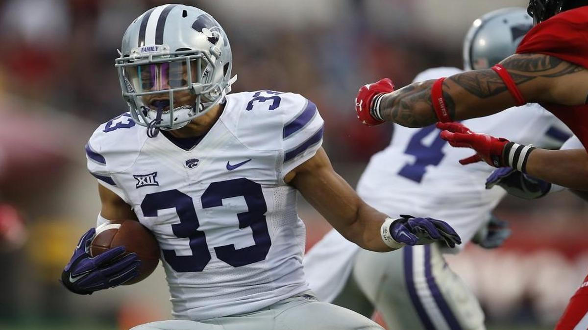 Kansas State defensive back Morgan Burns looked for running room during Saturday’s game at Texas Tech.