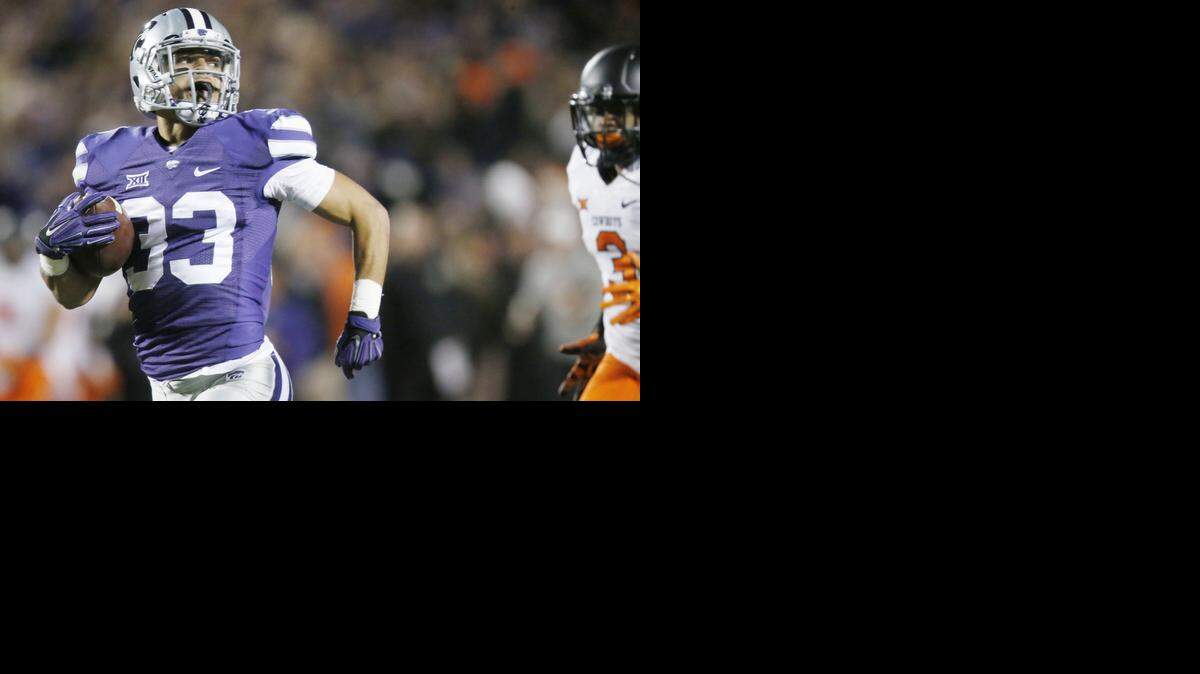 
K-State defensive back Morgan Burns (33) takes off on an 86 yard kickoff return for a touchdown Saturday night against Oklahoma State. (November 1, 2014)

