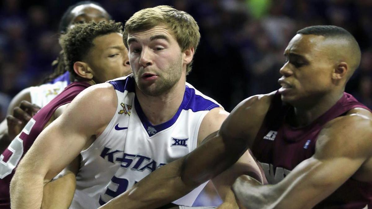 Kansas State forward Austin Budke (left) tried to control a rebound against Maryland-Eastern Shore guard Mark Blackmon on Friday night.