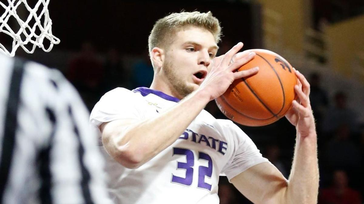 K-State forward Dean Wade grabs a rebound against Robert Morris in Manhattan.